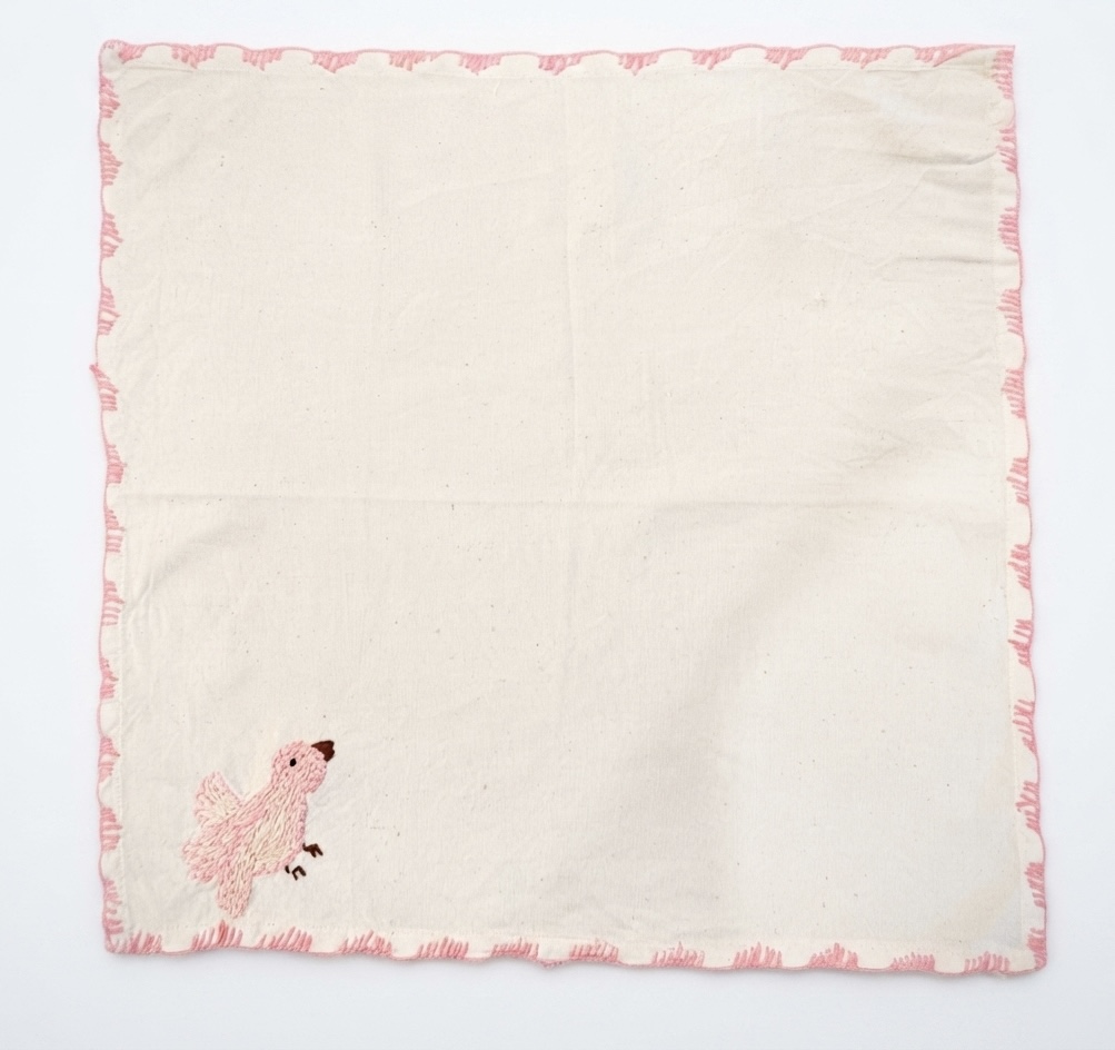 3. The Kala Cotton Twill Songbird Napkin – Hand-Embroidered Bird Motif with Pink Border - Image 3