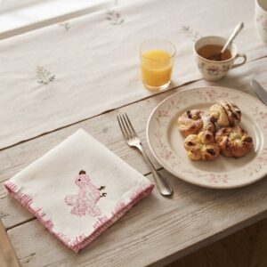 3. The Kala Cotton Twill Songbird Napkin – Hand-Embroidered Bird Motif with Pink Border